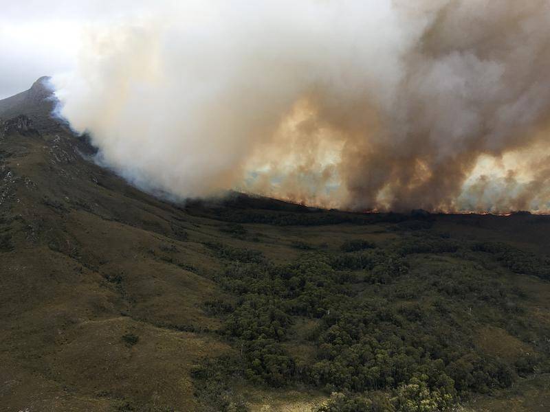 A fire is still burning near Gell River, northwest of Hobart, scorching more than 20,000 hectares.