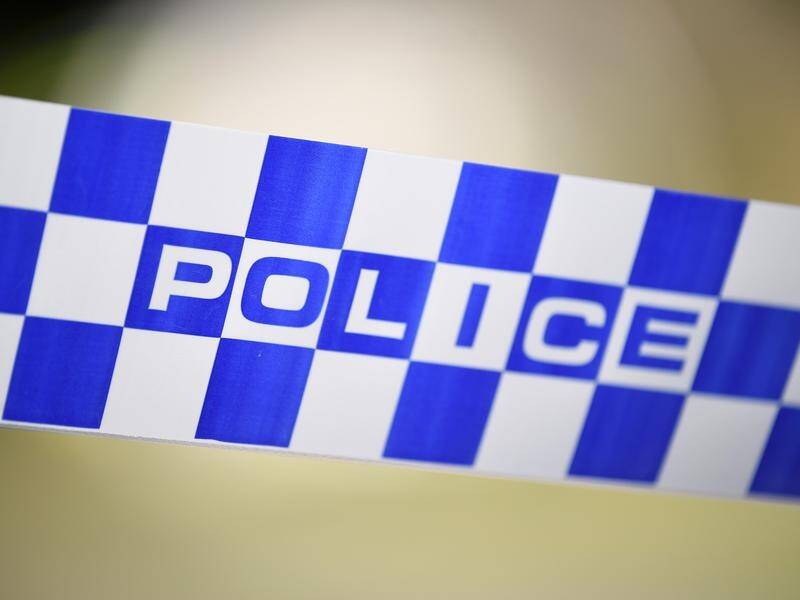 A woman has been arrested after the death of another woman at a property in Adelaide's north.