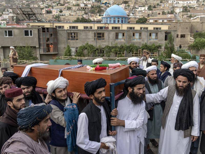 The bomb went off in a Kabul mosque during evening prayers, killing 21 people and injuring 33. (AP PHOTO)