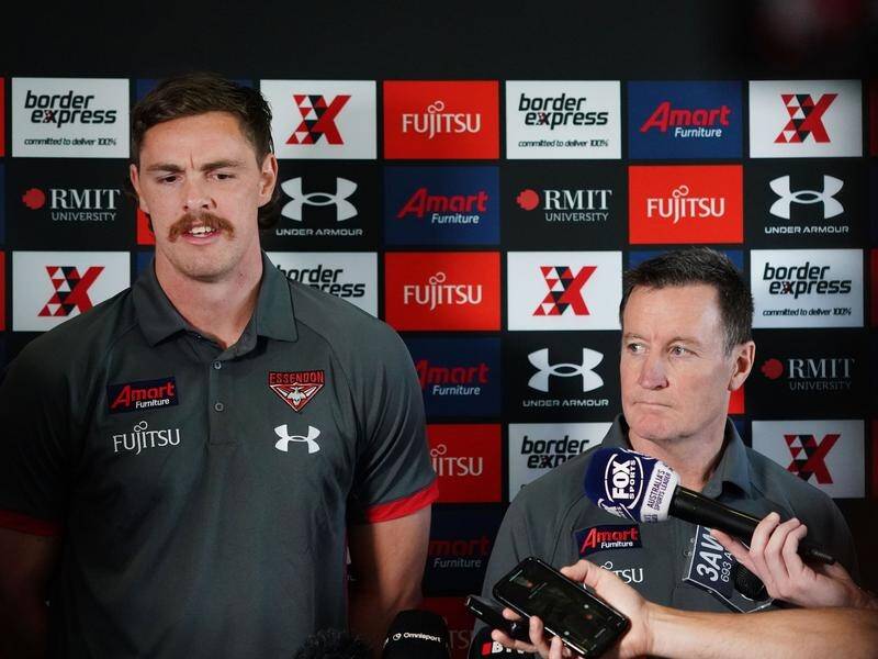 Essendon's Joe Daniher and coach John Worsfold fronted the media in Melbourne.