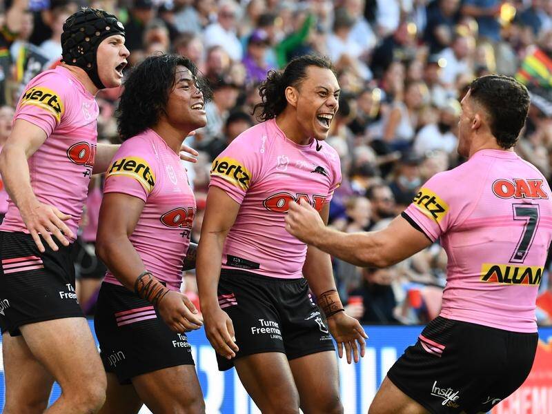 Penrith's Jerome Luai (2nd r) says they are unfazed by any talk from the NRL critics.