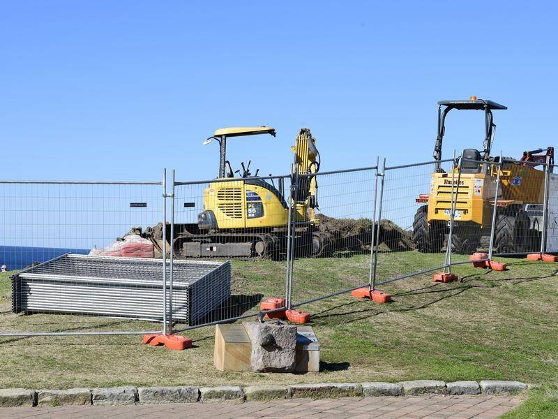 Work has begun on the path the organiser of Sydney's Sculpture by the Sea says will kill the event.