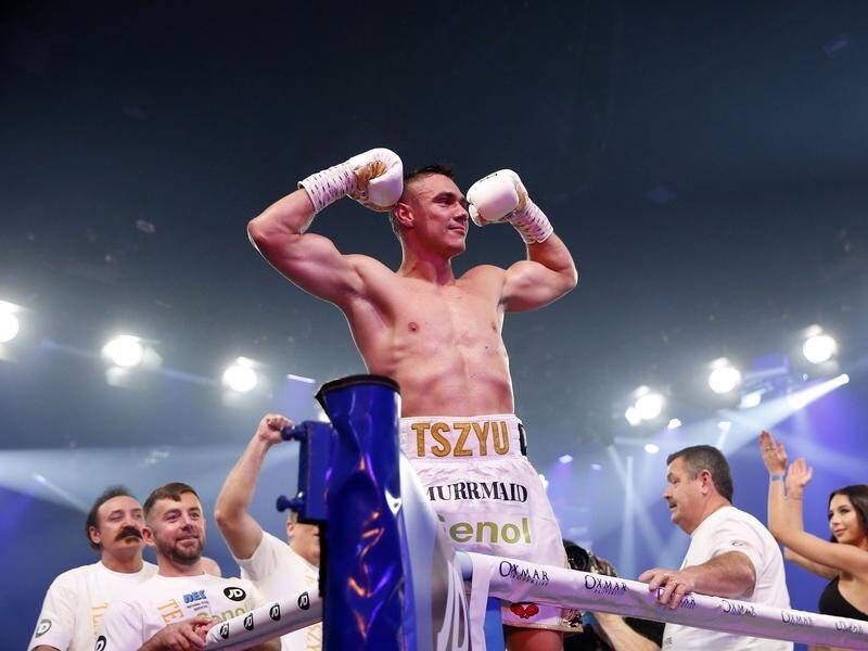 Tim Tszyu claims victory in his super welterweight title bout with Stevie Spark.
