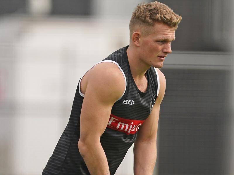 Adam Treloar is expected to miss Collingwood's AFL clash with Richmond due to injury.