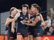 Carlton have stayed in the hunt for an AFL top-four berth after a 31-point win over Fremantle.