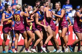 Brisbane have won their second AFLW title with a 17-point grand final win over North Melbourne. (Joel Carrett/AAP PHOTOS)