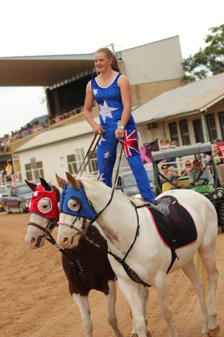 Miah Bryant performing a roman ride demonstration at the 2015 Gunnedah Show, soon after winning two national trick riding titles in Sydney.