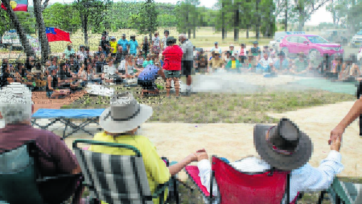 Joining hands: Gomeroi people protest against the possible destruction of Lawler’s Well.