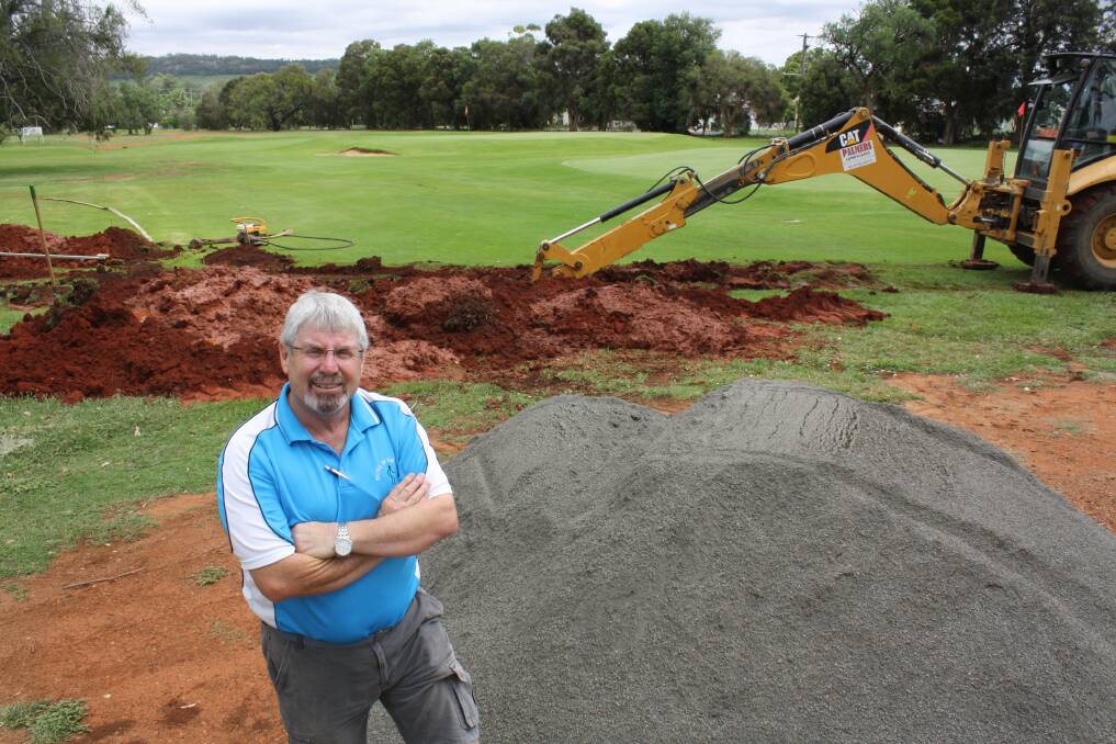Gunnedah Golf Club secretary Peter Vernon at the on-course drainage works which is helping to conserve water.