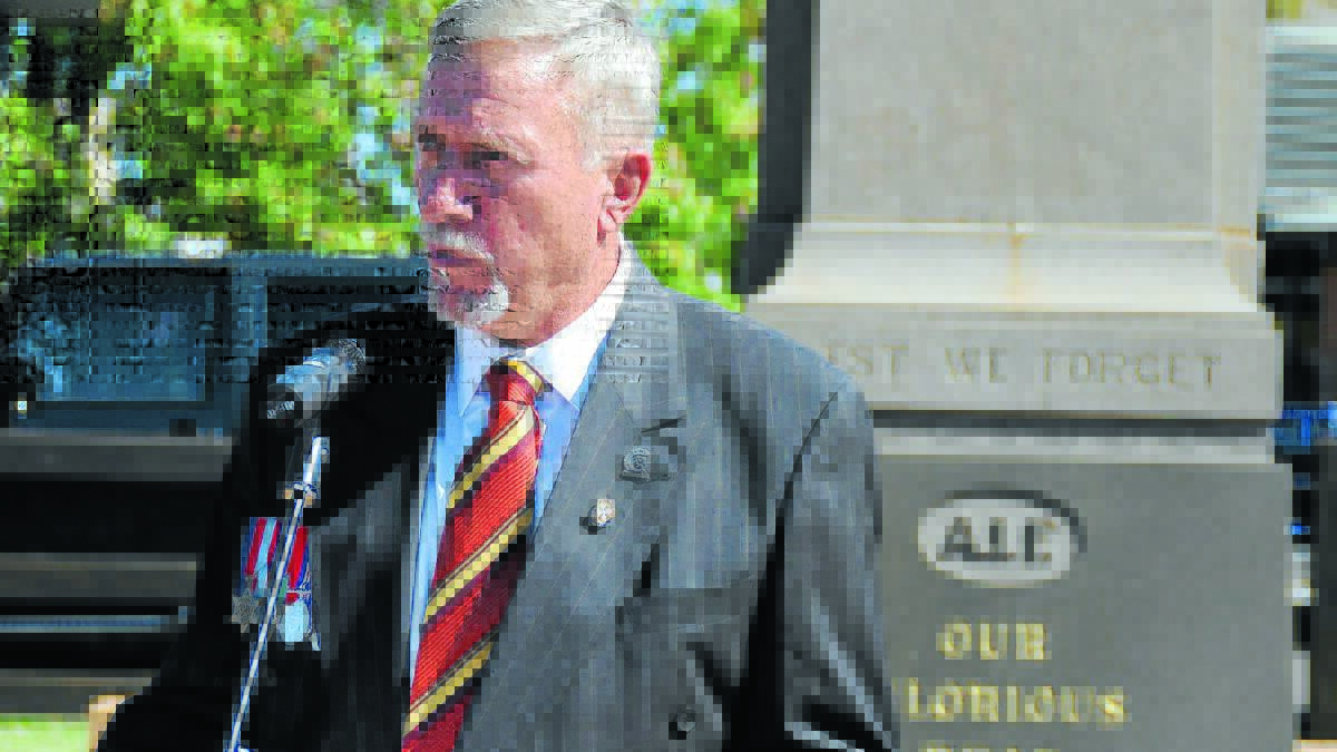 Gunnedah mayor Owen Hasler gives a commemorative address.