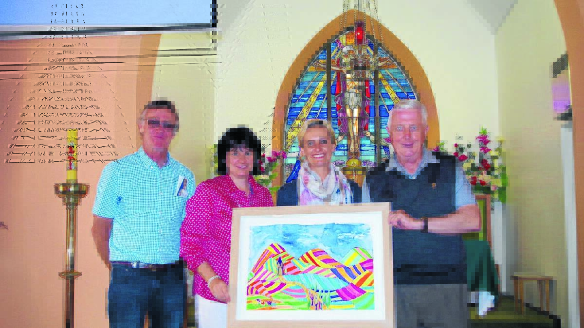 Father Bernie Hennessy, right, receiving a painting as a farewell gift from Jugiong parishioners Bill Graham, left, Paula Butt and the artist Stephanie Corkhill-Hyles.