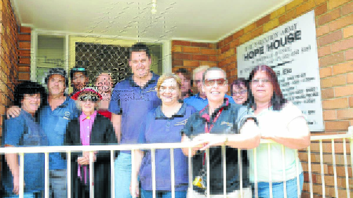 Gunnedah’s newest Salvation Army officers Richard and Gaye Day (centre) with Hope House assistant co-ordinator Shannon Price (front second right) and members of the Gunnedah community.
