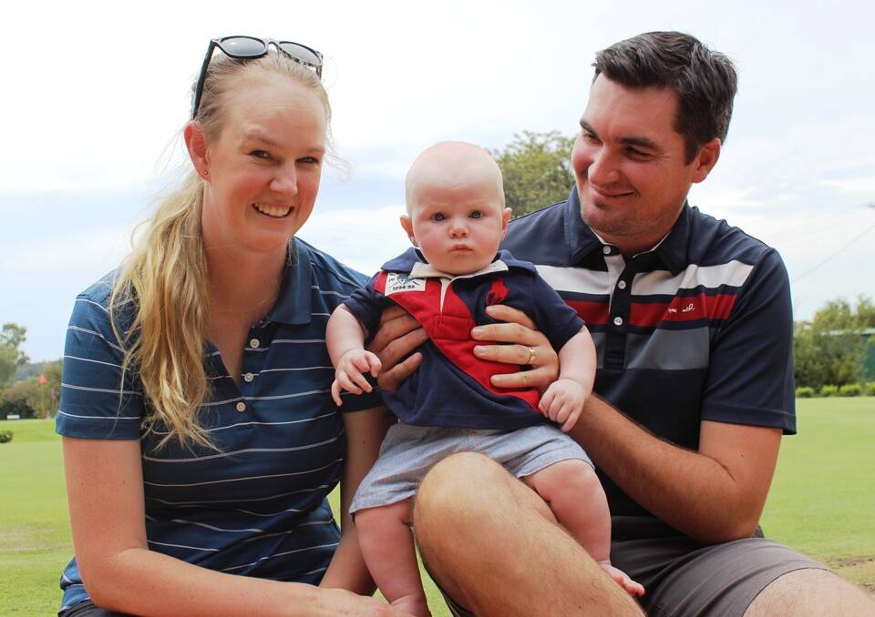 New Gunnedah Golf Club professional, Luke Ryan, with wife Ellie and five-month-old son, Buddy. 