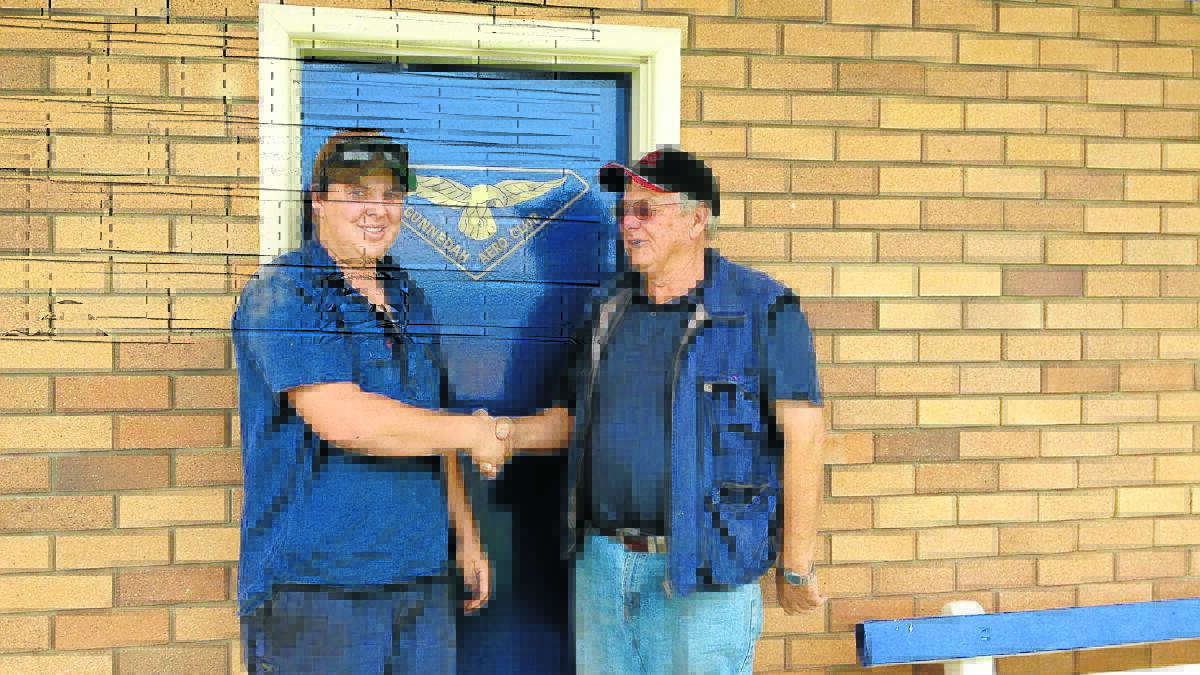 Lachlan McArthur is the 2014 recipient of the Chris Middlebrook Scholarship. He is pictured with Peter Middlebrook at the Gunnedah Aero Club.