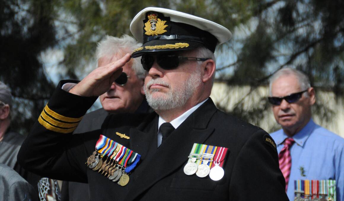 Royal Australian Navy Commander Gary Brown, based in Yass, attended the service with his son Simon and three grandchildren.