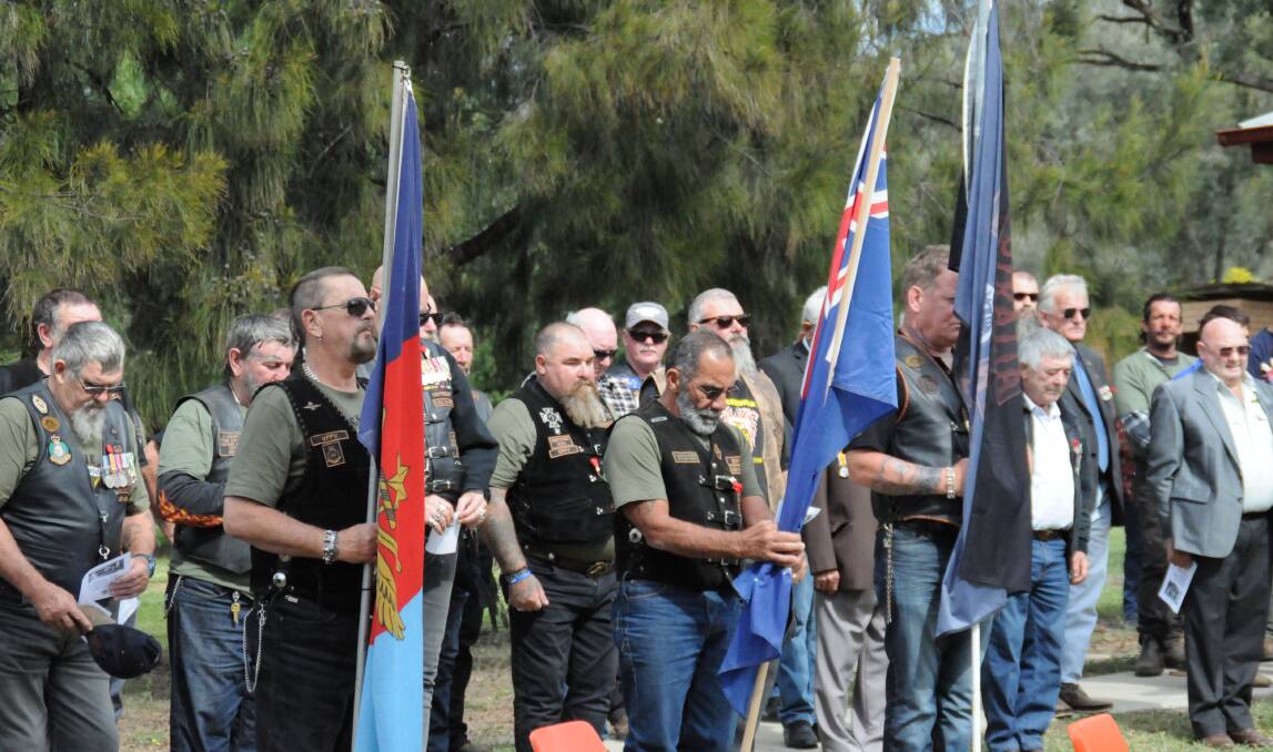 Members of the Veterans Motorcycle Club attend the service.