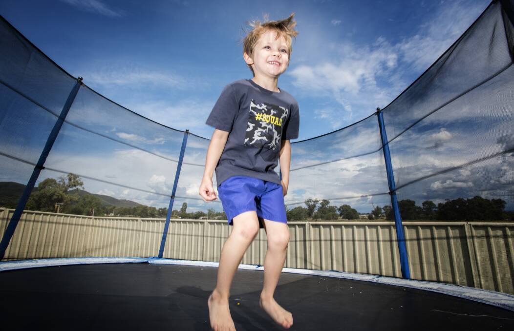 JUMP SAFELY: Levi Sheridan's mum purchased a trampoline with a safety net to prevent injury. Photo: Peter Hardin 140317PHF02
