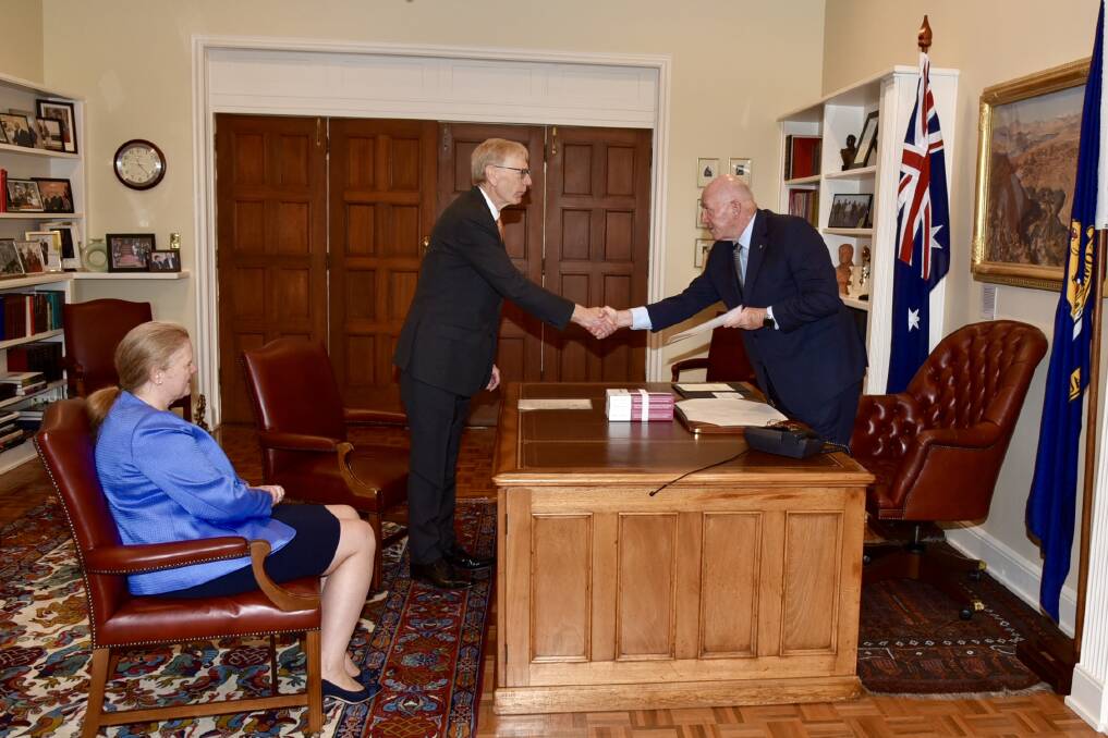 Handover: The Governor-General Sir Peter Cosgrove receives the final report of the Banking Royal Commission from Commissioner Kenneth Hayne and commission CEO Toni Pirani.
