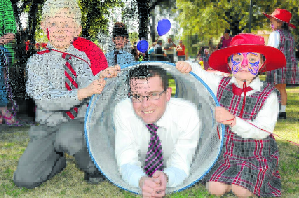 Mayor Adam Marshall joins in on the fun and games at the Teddy Bear’s Picnic, pictured with Sebastian Rowe (5 ) and Ava Coleman (5) from Gunnedah South Public.