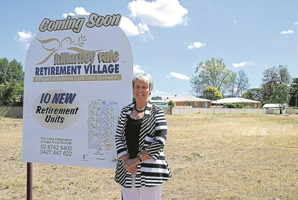Killarney Vale Retirement Village chairperson Anne Riordan at the block where the units will be built.