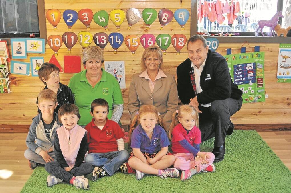 PICTURED inside the new school readiness room are pre-schoolers Luke Jones, Lily Grant, Cai Garrett, Tahlia Smith and Tayla Dudley, Jack Johnson (back row), and early childhood teacher, Fiona Langdon, along with Shenhua’s Debbie Watson and Paul Jackson. Absent: Clayton Frend and Ella Hancox. 