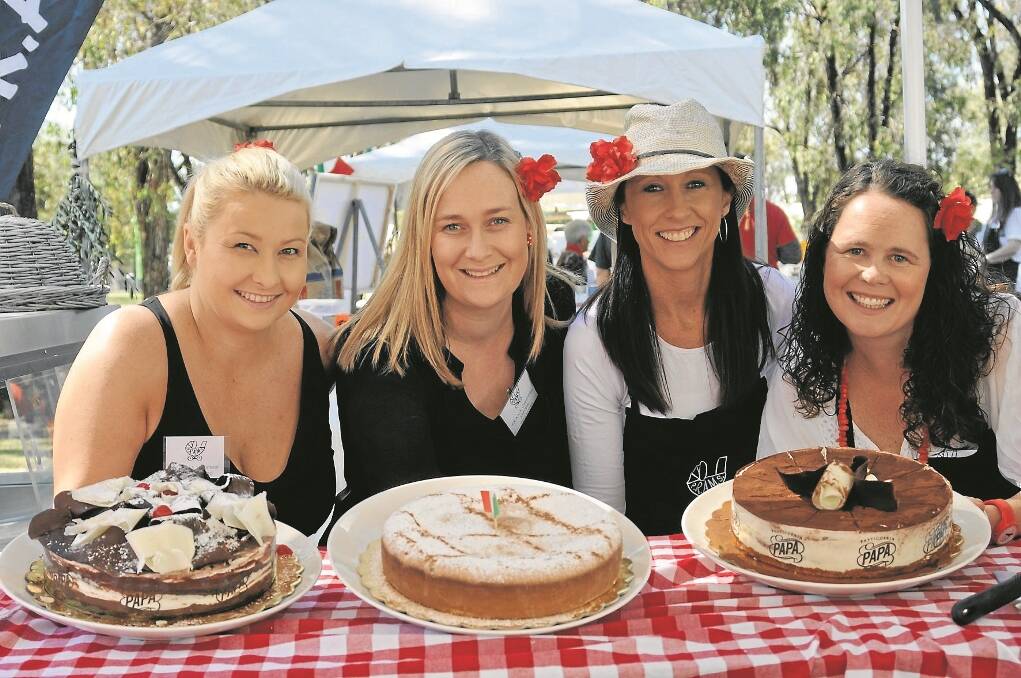 Laura Fulwood, left, Heidi Mainey, Kim Street and Olivia Brown showing off the sumptuous delights available on the PRAMS stall at Annual Porchetta Day. They sold out completely before 3pm.