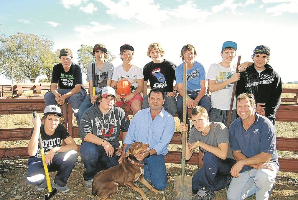 Gunnedah boys taking part in the Trelawney project include, back from left, Ned Cameron, Zach Went, Eathan Weekes, William Johnson, Daniel Wise, Tyson Andrews and Clifton Kelly. Front from left, Stevie Matthews, Jack Bell, Trelawney farm manager Craig Watton, Ridge Paine and Tamworth-based mentor Barry Allen.