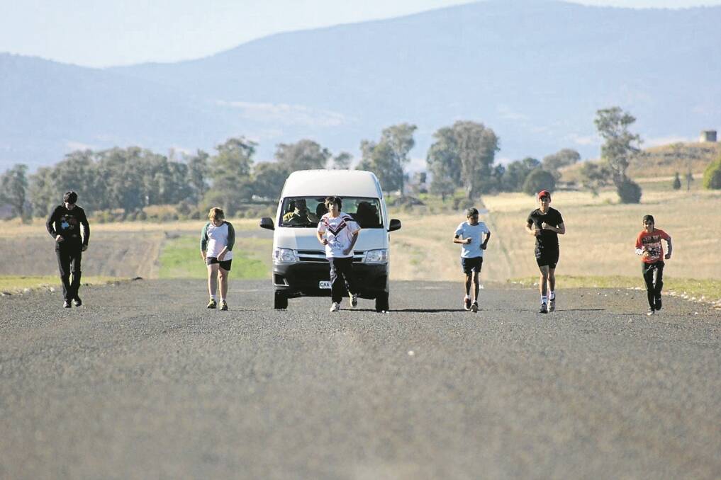 ABORIGINAL boys running along the Pullaming stock route as part of the Cumbo Gunerah run from Breeza are Joey Golsby, Jack Mills, Samuel Griffiths, Ivan Smith, Tony Griffiths and David Golsby.