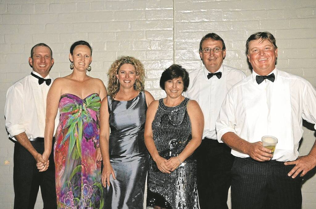 All dressed up for the ball, from left, Pat Hodges, Jac Cowel, Kelly Swain, Sandy and Jamie Corbett and Steve Swain.