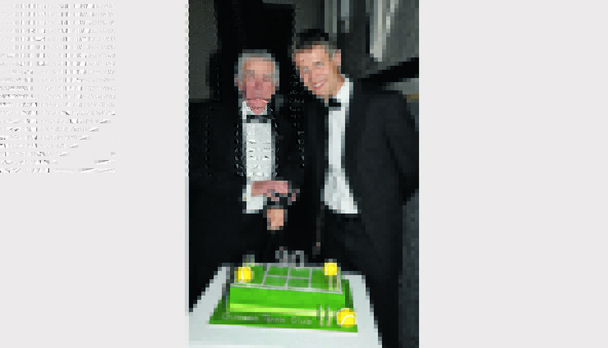 Guest speaker tennis great Ken Rosewall and club President Ben Robertson cut the 90th birthday cake.