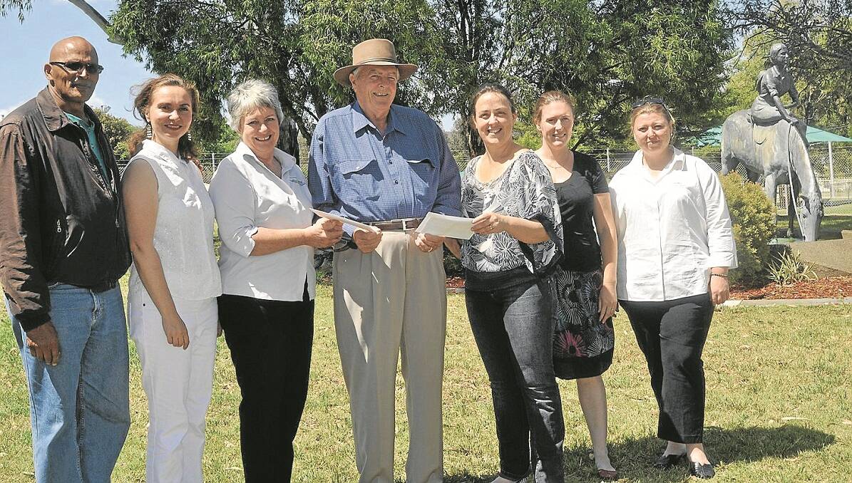 DOPROTHEA MAckellar Memorial Society President, John Pickett, centre, accepting cheques from Namoi CMA representative Felicity Baker ($2000), left, and Cr Rebecca Heath, representing Gunnedah Shire Council ($3150). Also pictured are Paul Williams, left, project officer Mila Stone, Kathryn Yigman and Kylie Smith.