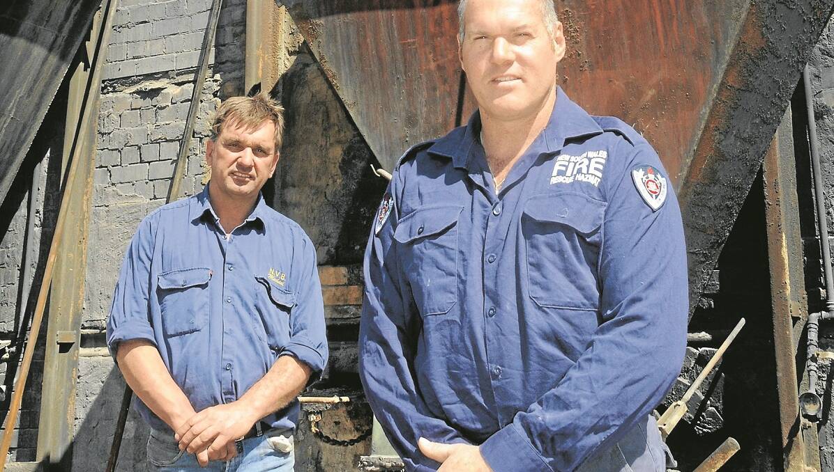 michael Broekman, left, from Namoi Valley Bricks encourages all businesses to get behind the NSW Fire and Rescue Service and allow their employees to join the ranks at the Gunnedah Fire Station or other emergency services, pictured with employee and retained firefighter, Rod Hall.